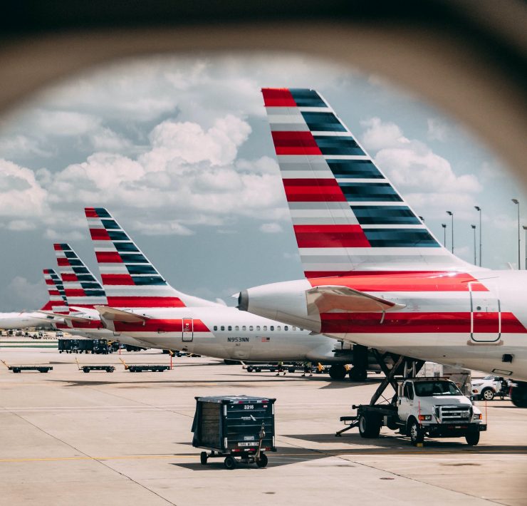 airplanes parked on a runway