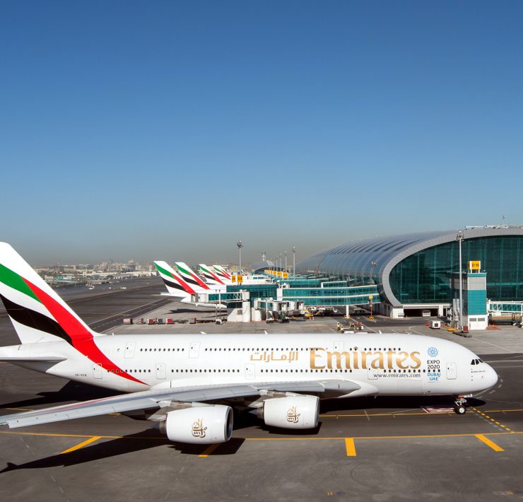 a large white airplane on a runway