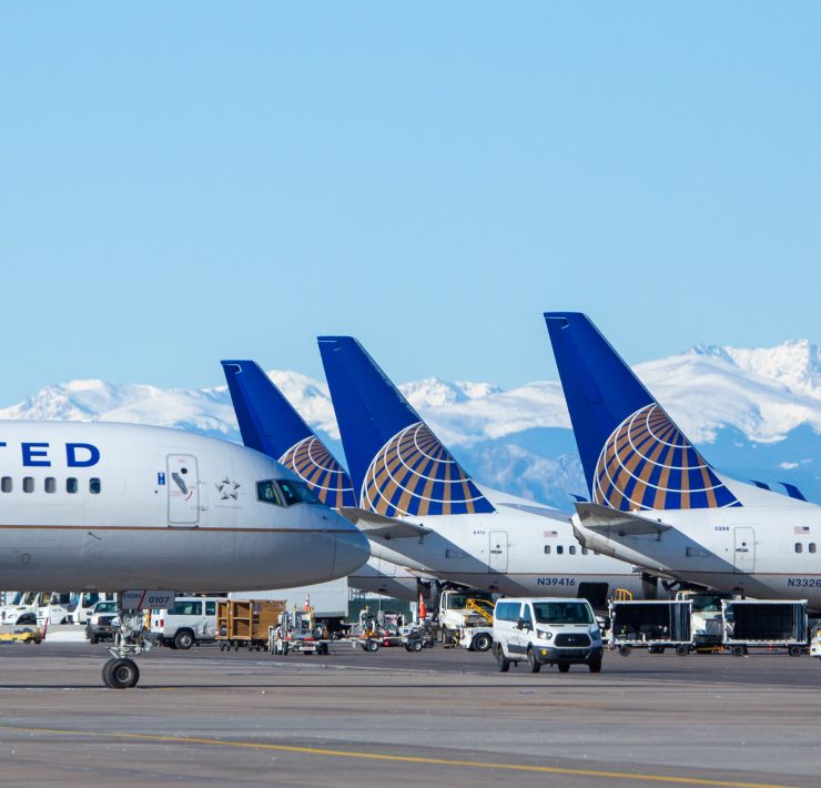 airplanes parked on a runway