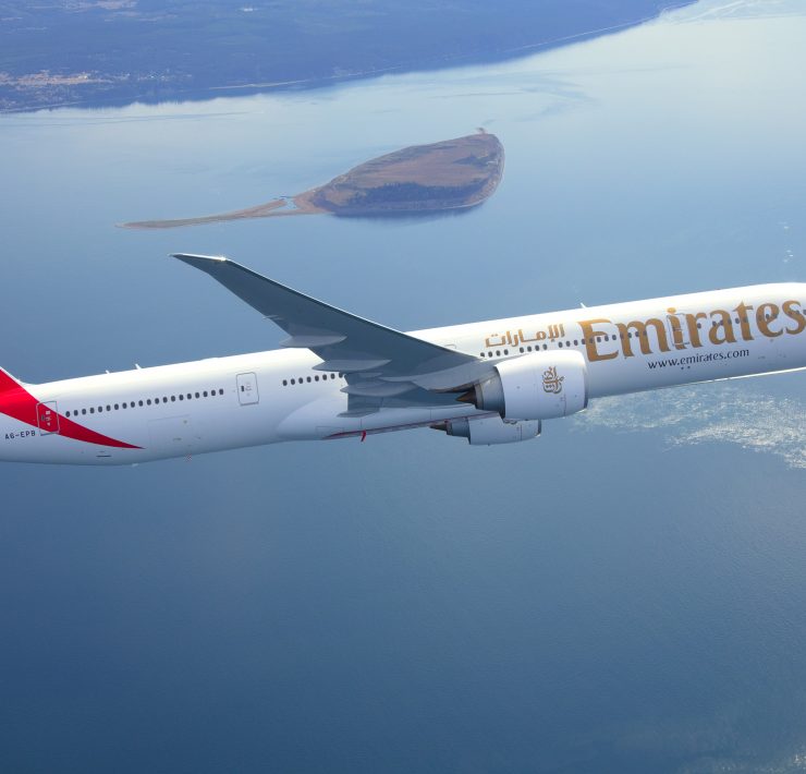 a plane flying over water