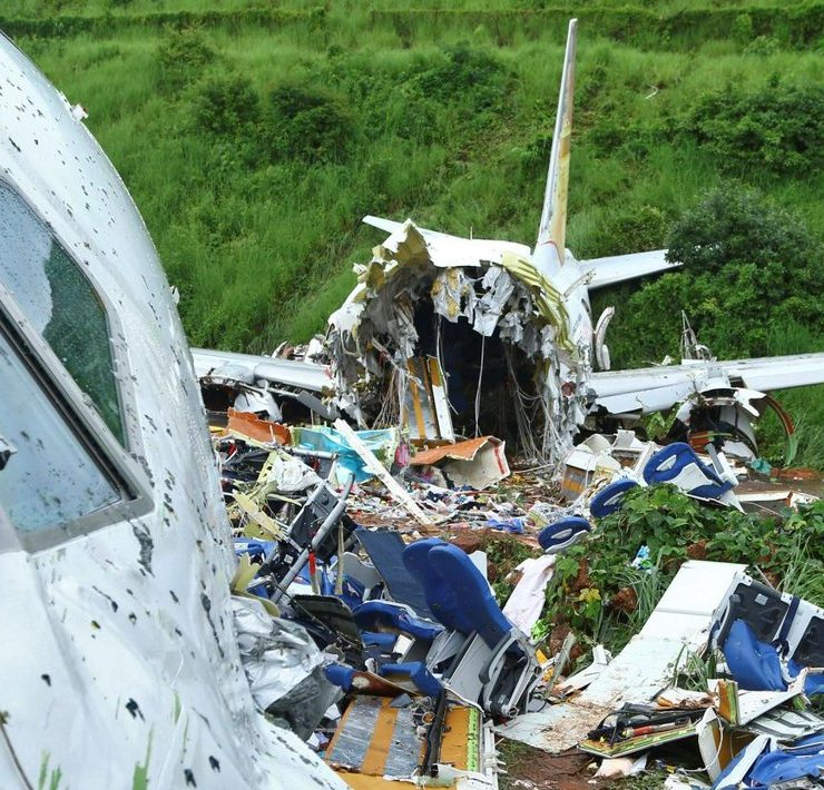 a crashed airplane in a field