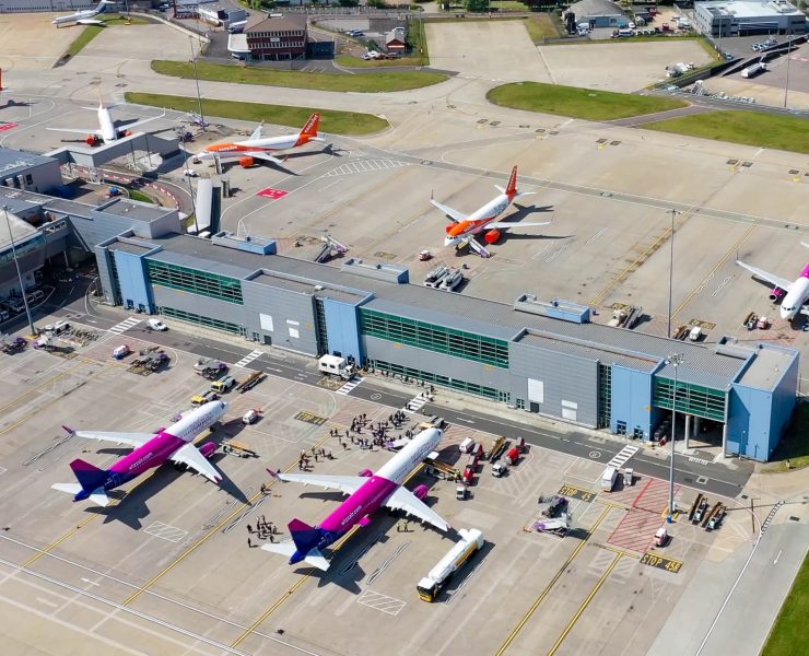 an aerial view of airplanes parked at an airport