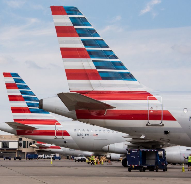 airplanes parked at an airport