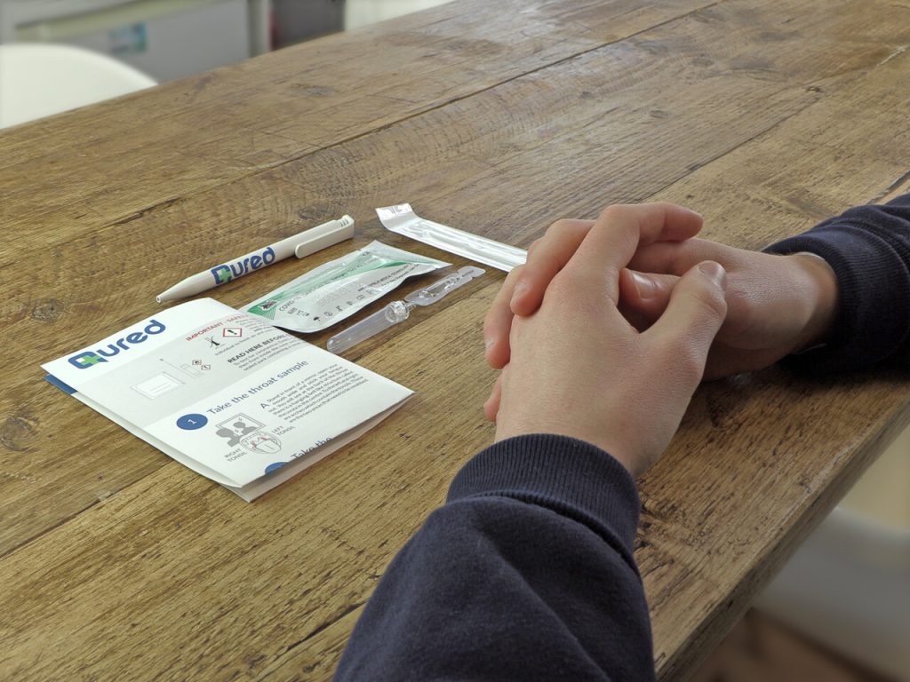 a person's hands on a table