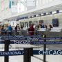 a group of people in an airport