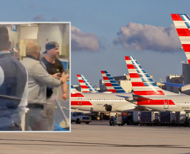 a group of people standing next to airplanes