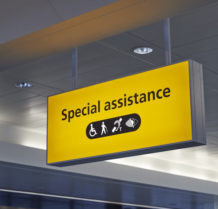 a yellow sign with black text and symbols