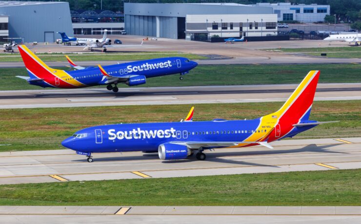 two airplanes on a runway