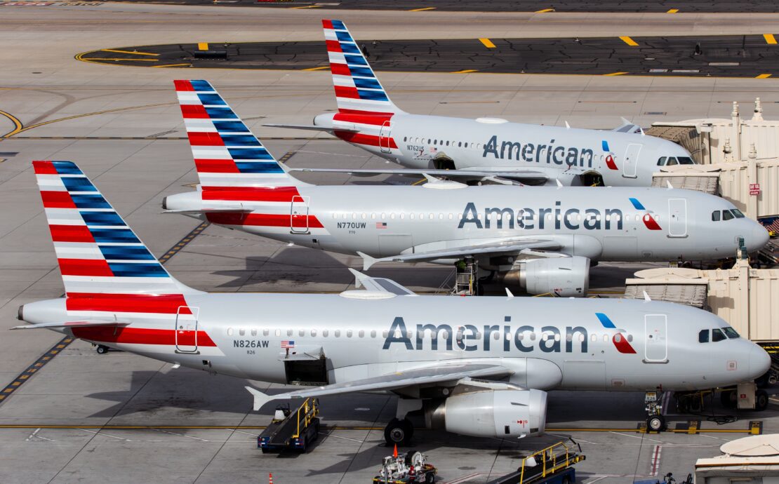 airplanes parked on a runway