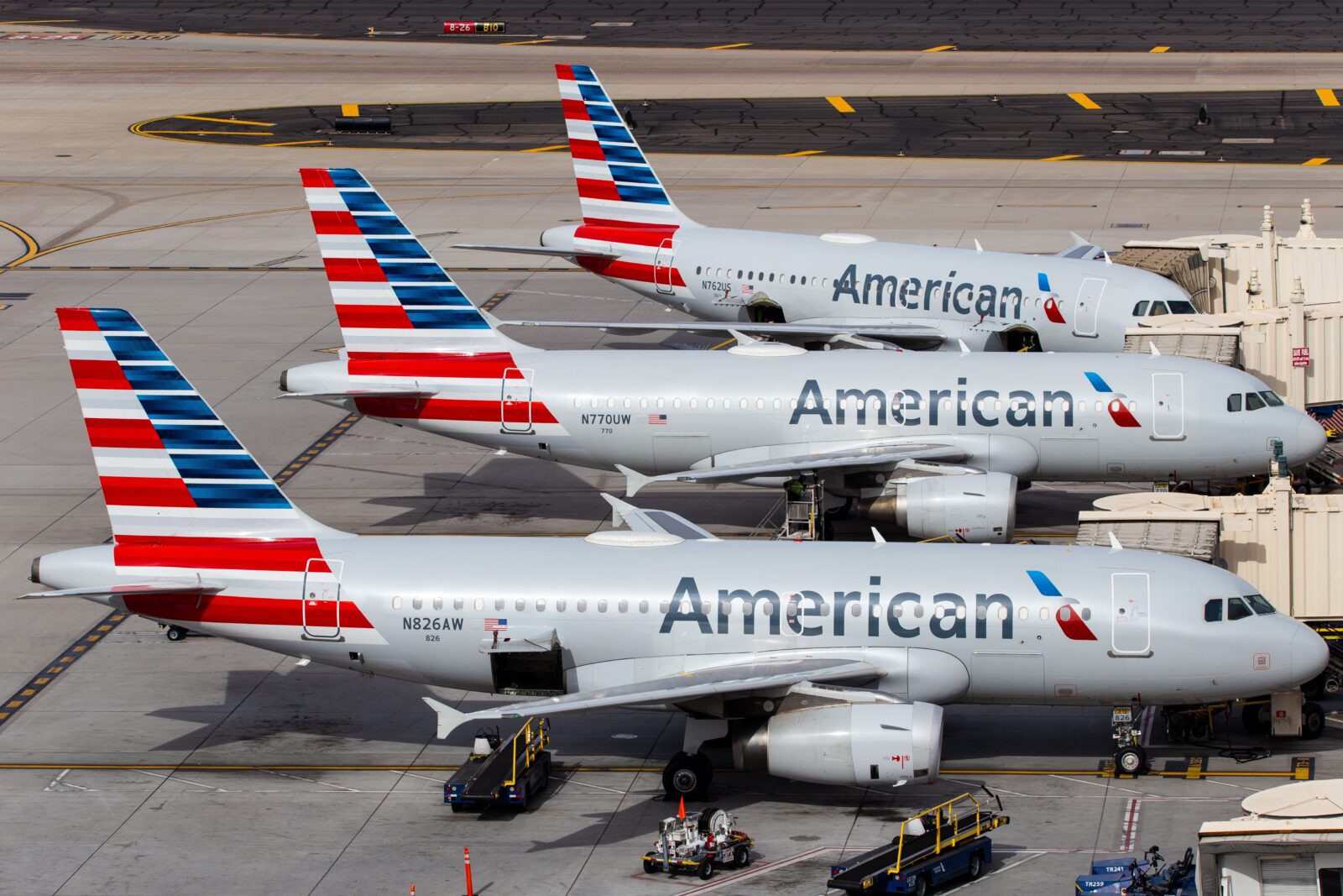 airplanes parked on a runway