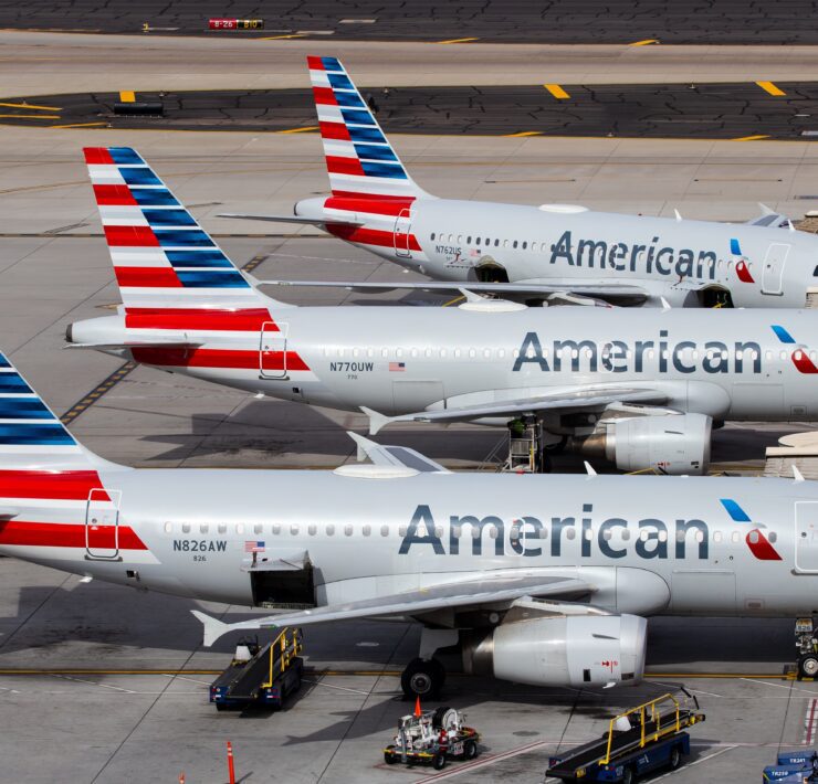 airplanes parked on a runway