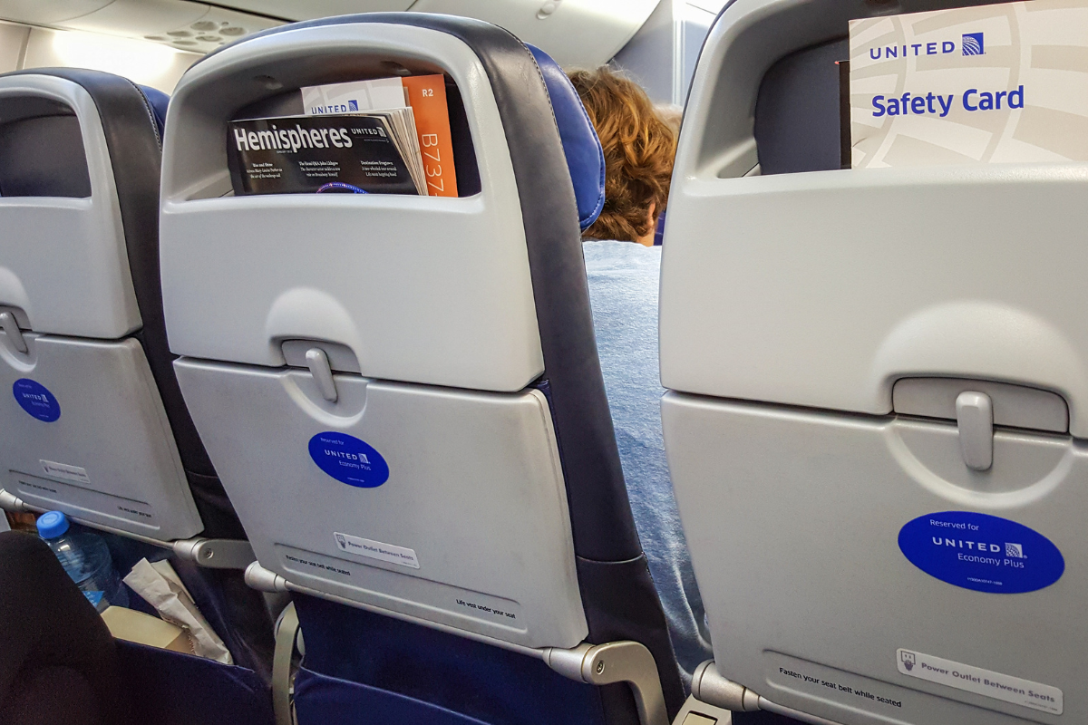 a person sleeping on an airplane