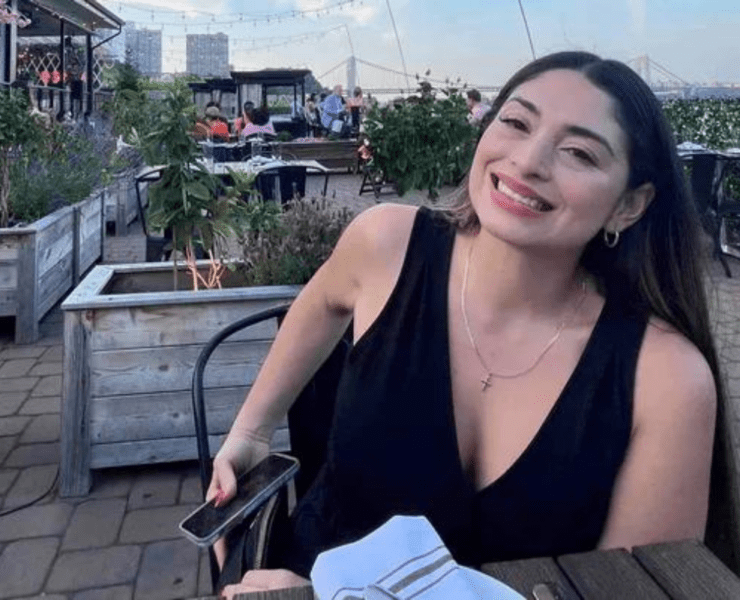 a woman sitting at a table