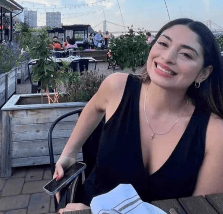 a woman sitting at a table