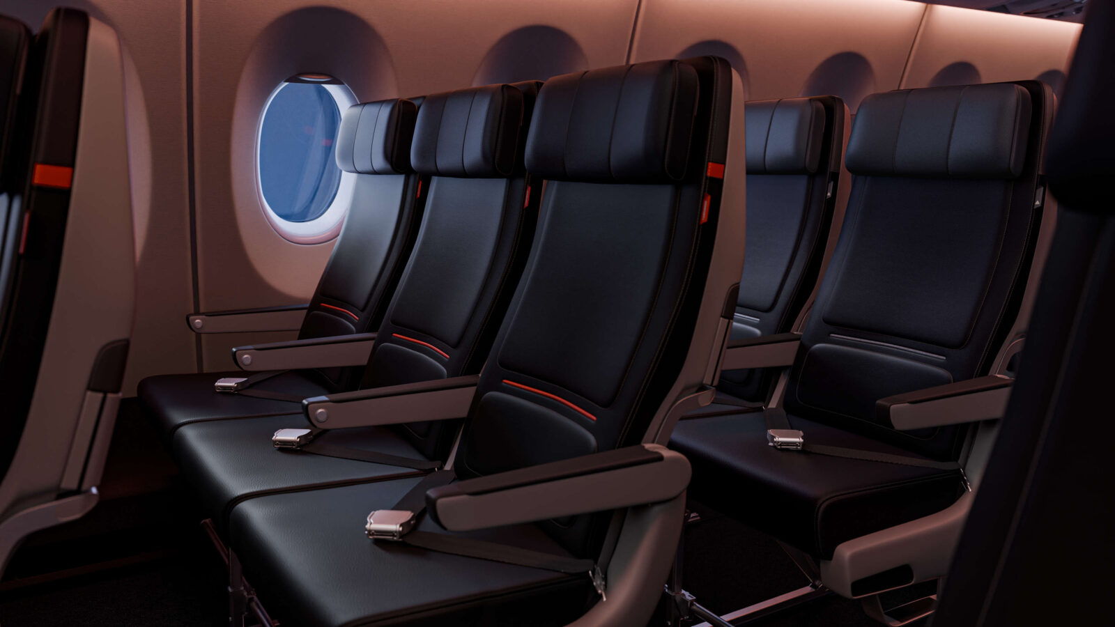 a row of black seats in an airplane