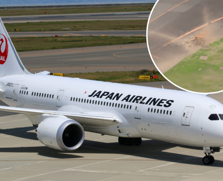 a white airplane on a runway