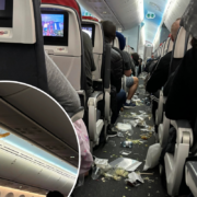 a group of people sitting on an airplane