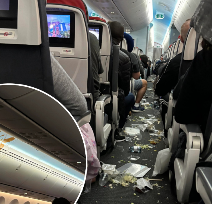 a group of people sitting on an airplane