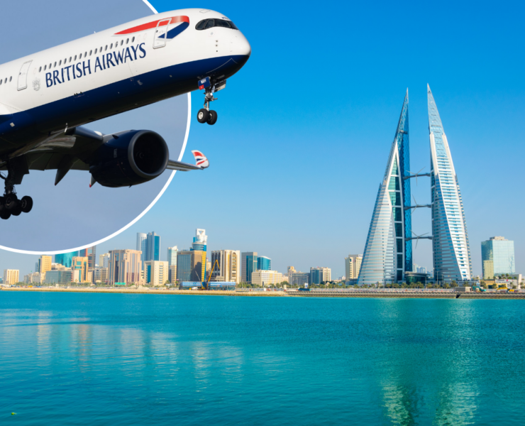 a plane flying over water and a city