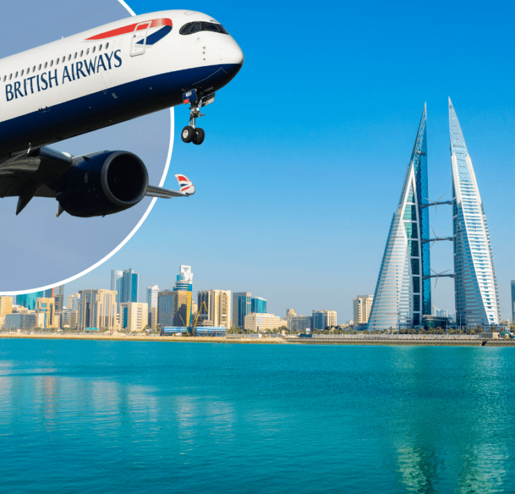 a plane flying over water and a city