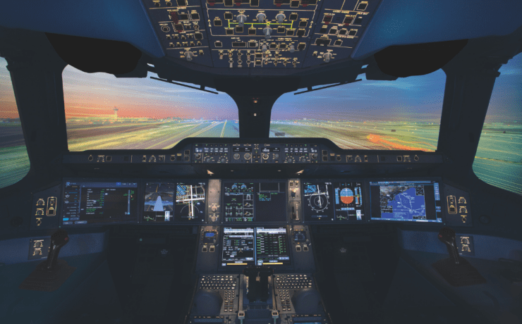 the cockpit of an airplane with multiple screens and a runway