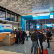 people standing in a terminal