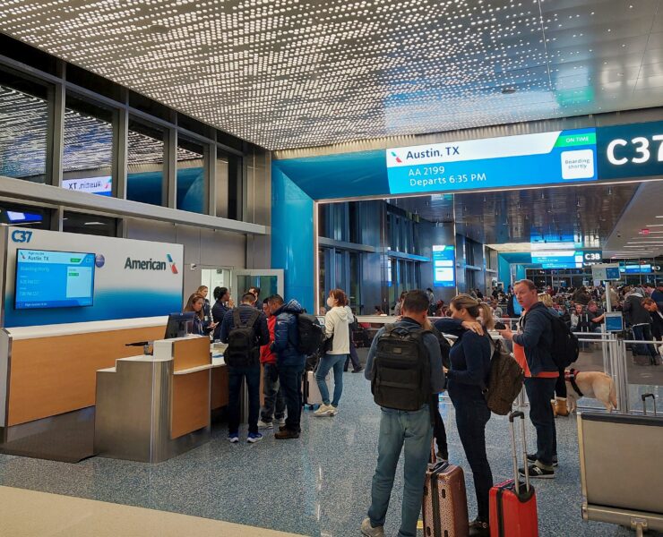 people standing in a terminal