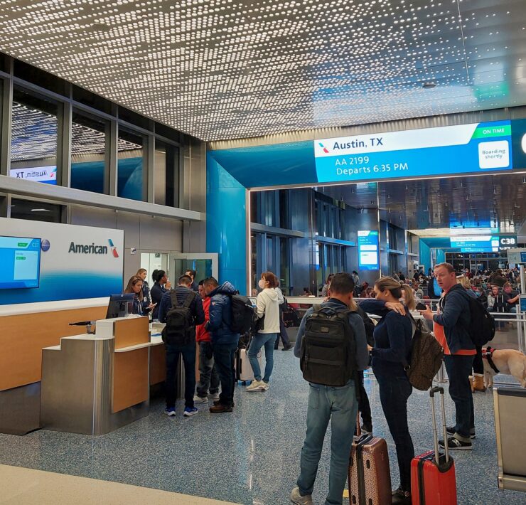 people standing in a terminal