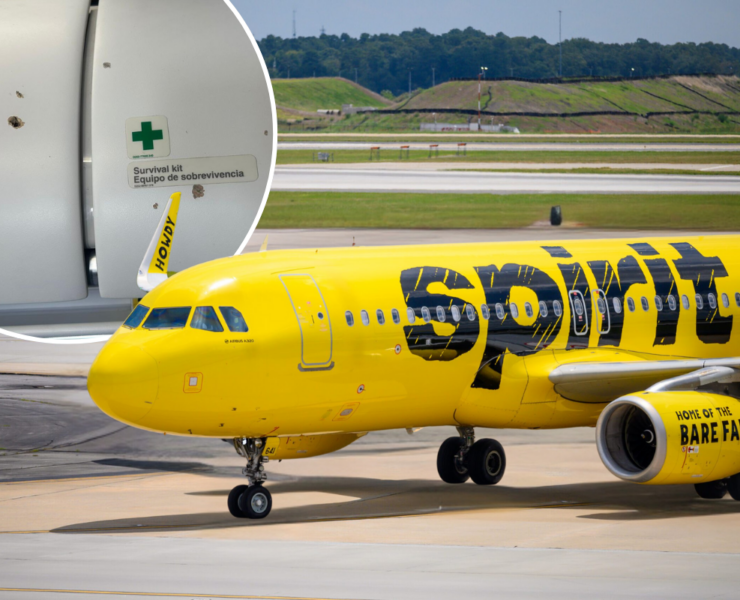 a yellow airplane on a runway