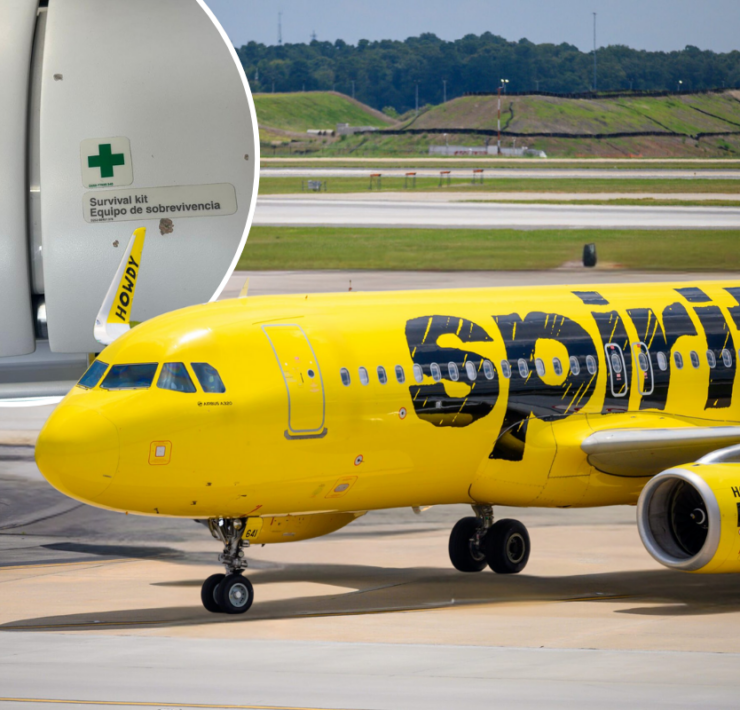 a yellow airplane on a runway