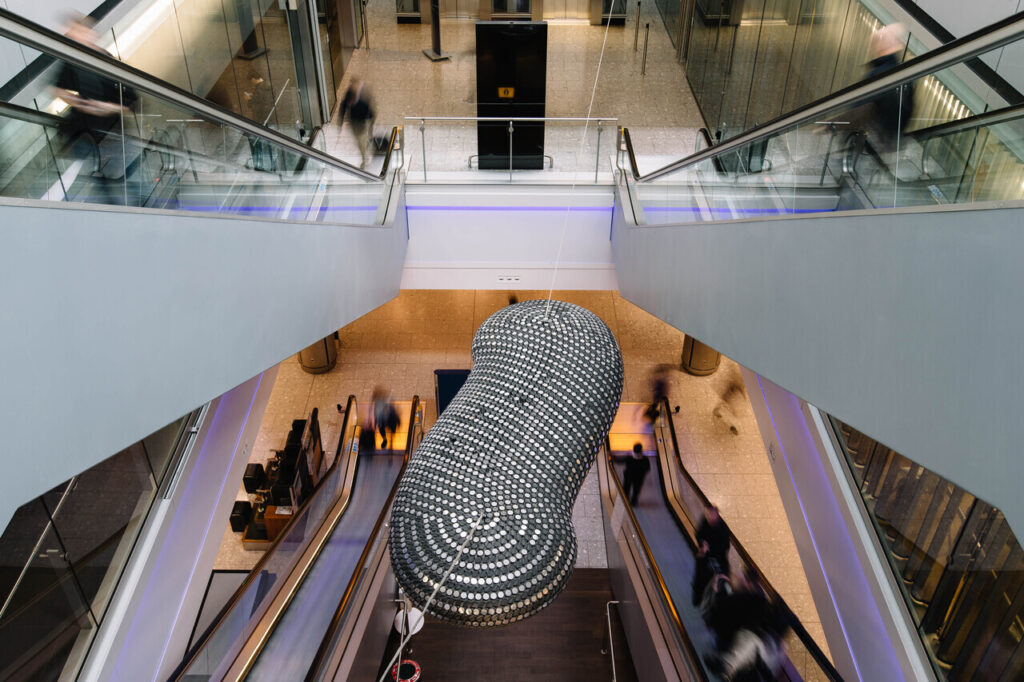 a large object from the ceiling of a building