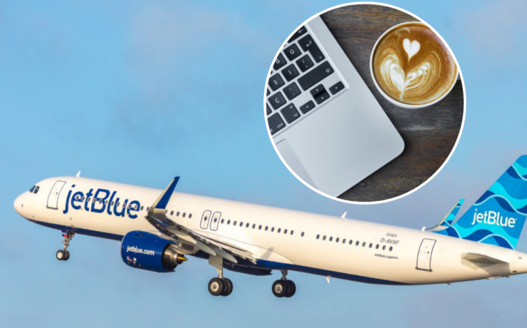 a plane flying in the sky with a laptop and a cup of coffee