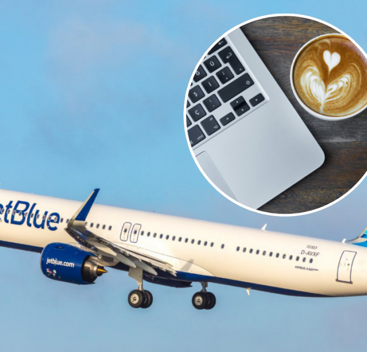 a plane flying in the sky with a laptop and a cup of coffee