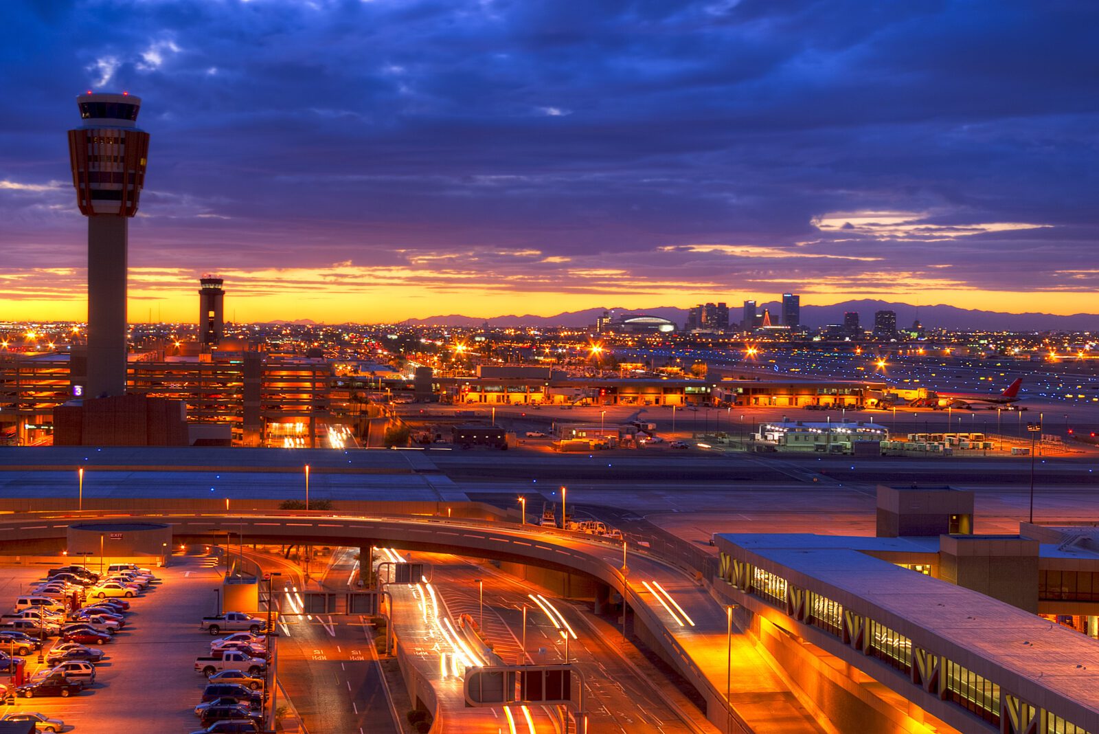 a city with lights and cars