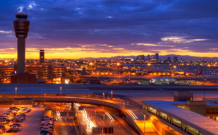 a city with lights and cars