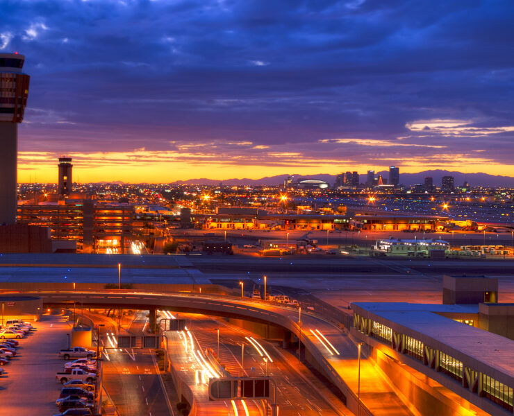 a city with lights and cars