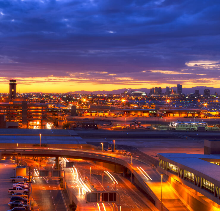 a city with lights and cars