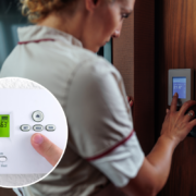 a woman using a digital thermostat