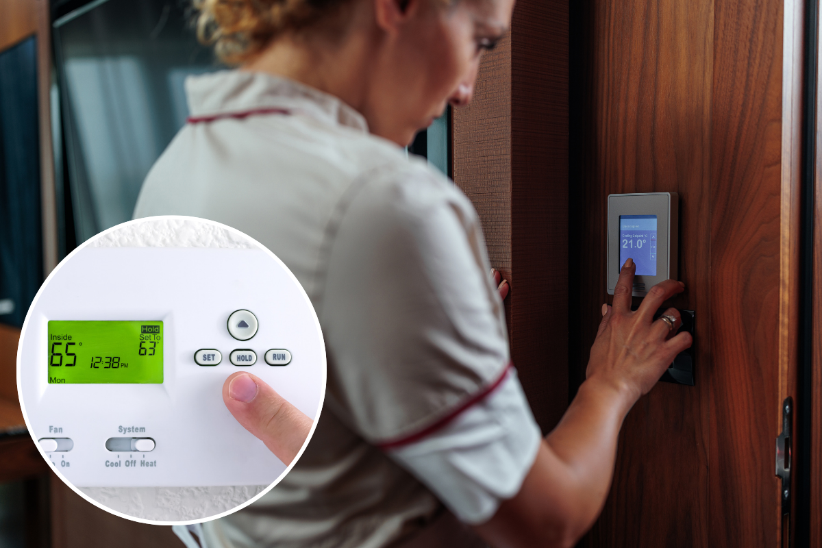 a woman using a digital thermostat