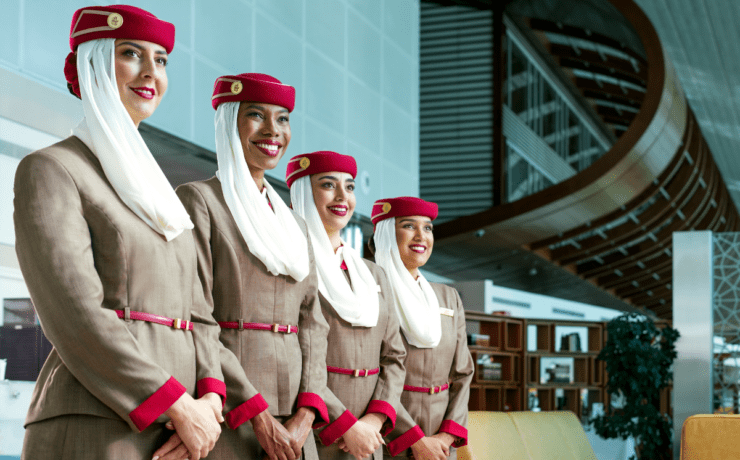 a group of women wearing matching outfits