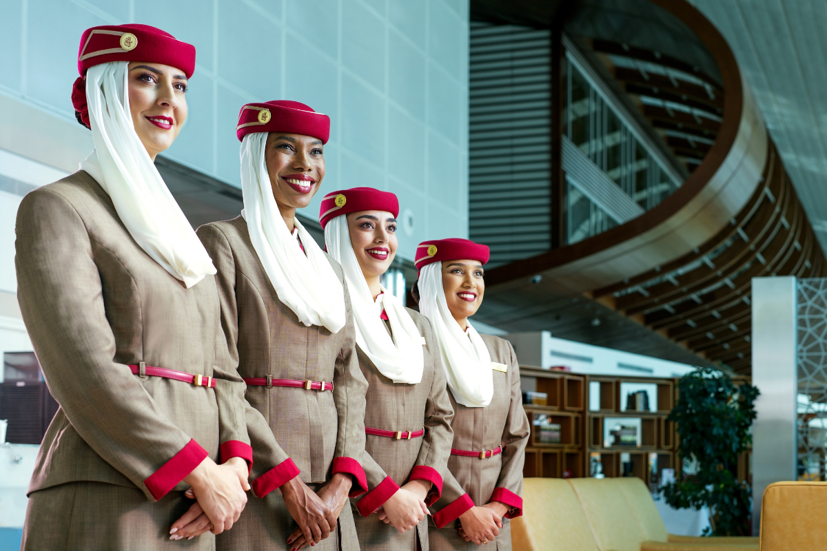 a group of women wearing matching outfits