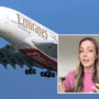 a woman in pink shirt and a plane