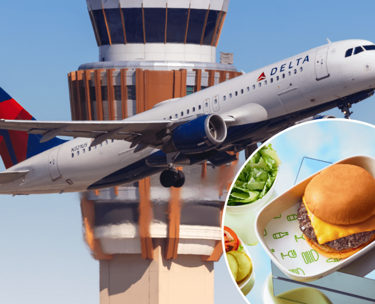 a plane flying in the air with food in a container